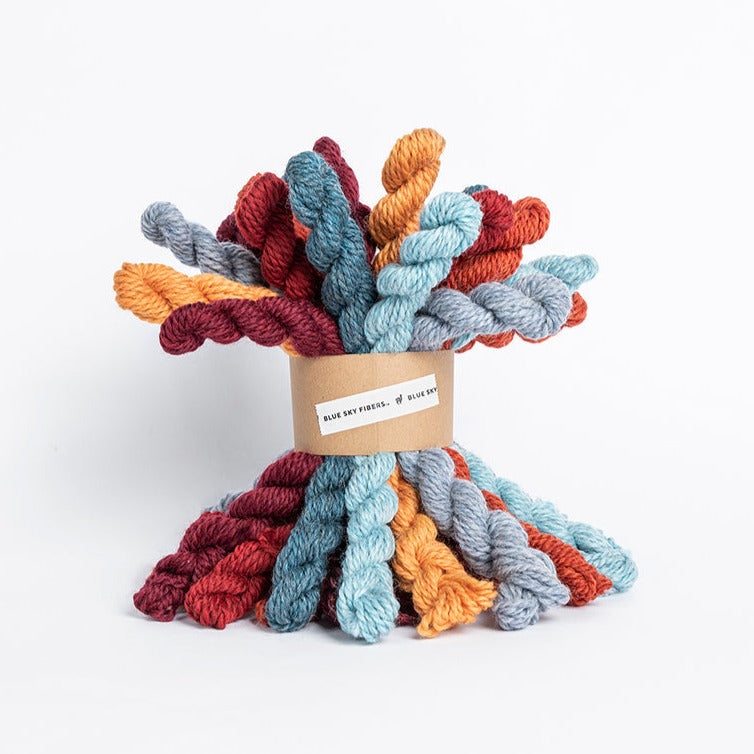 Blue Sky Woolstok Bundle Fire + Ice, 21 mini skeins in 7 varied warm and cool colors.