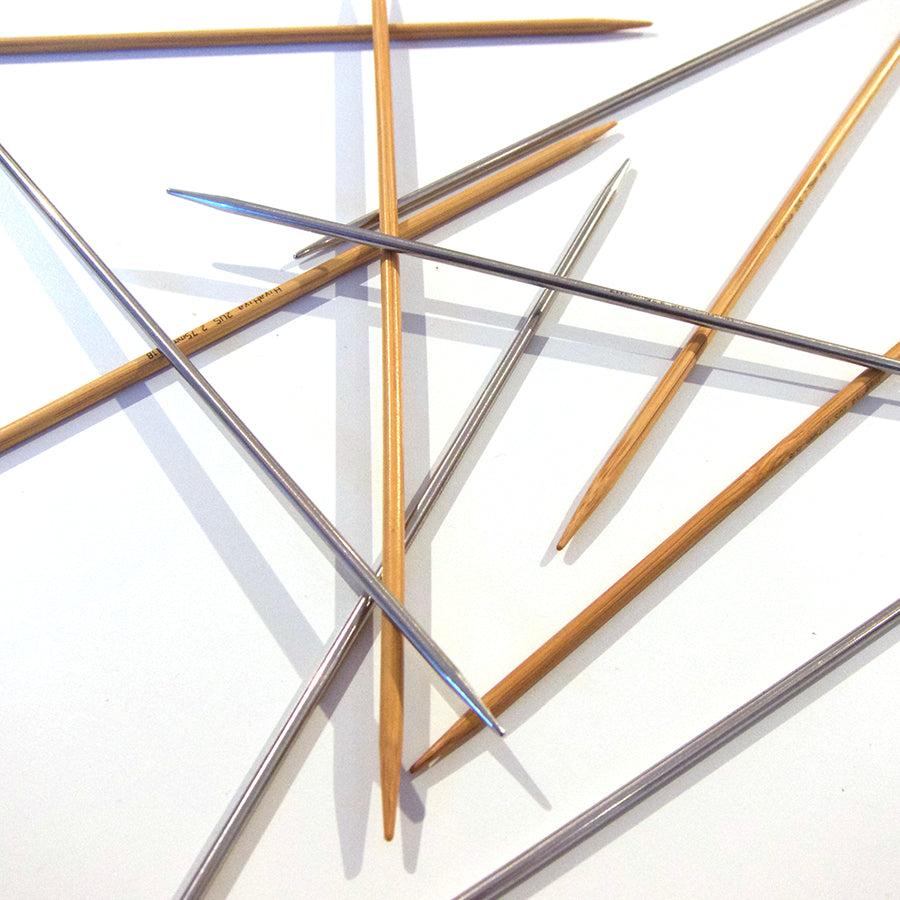 Image of a variety of double pointed needles. 