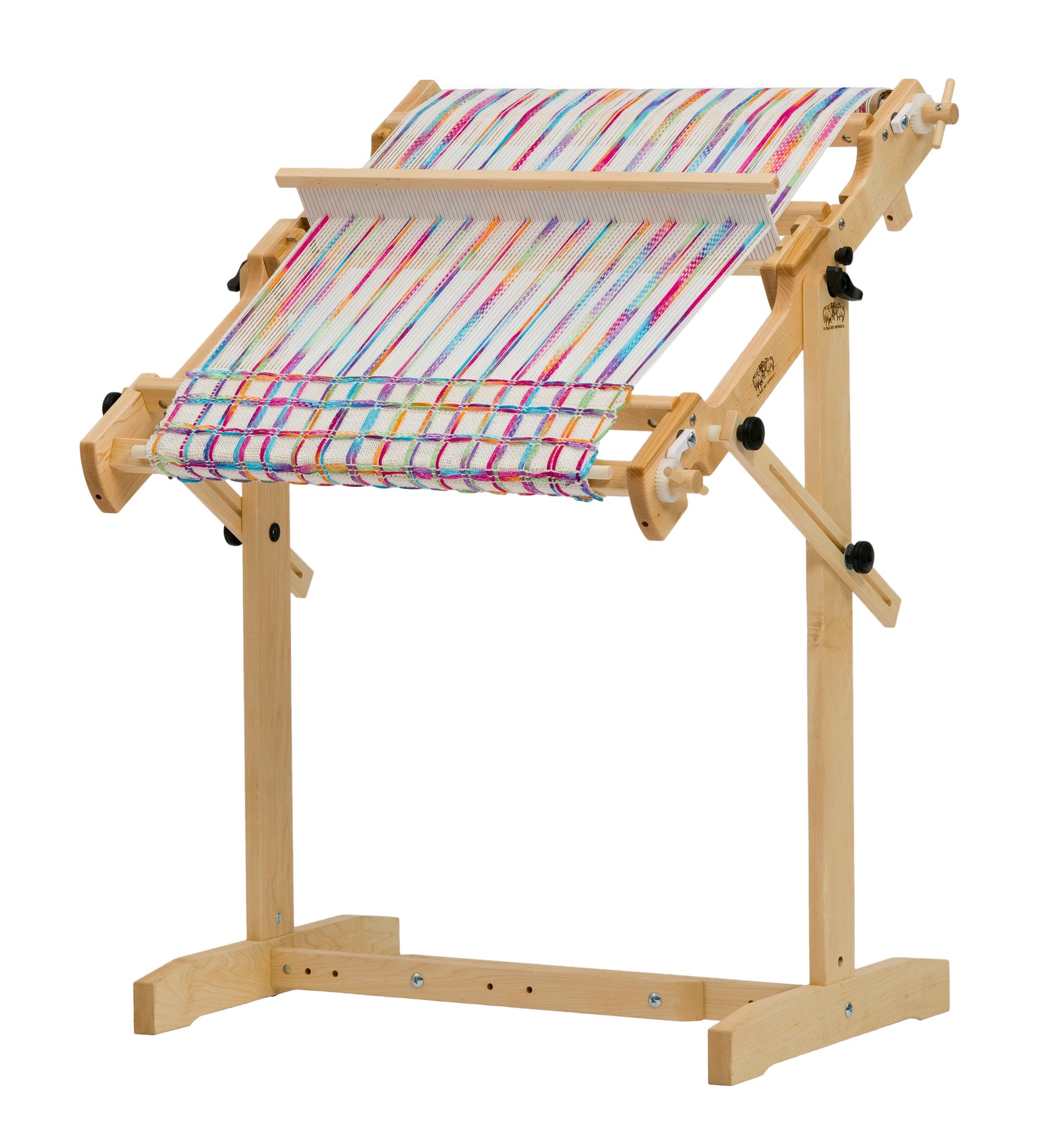 Image of a Schacht Flip Loom with 20" weaving width on a tresle floor stand.