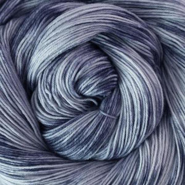 Detail of Greenwood Fiberworks Simply Sock Periwinkle Tonal in variegated shades of denim. 