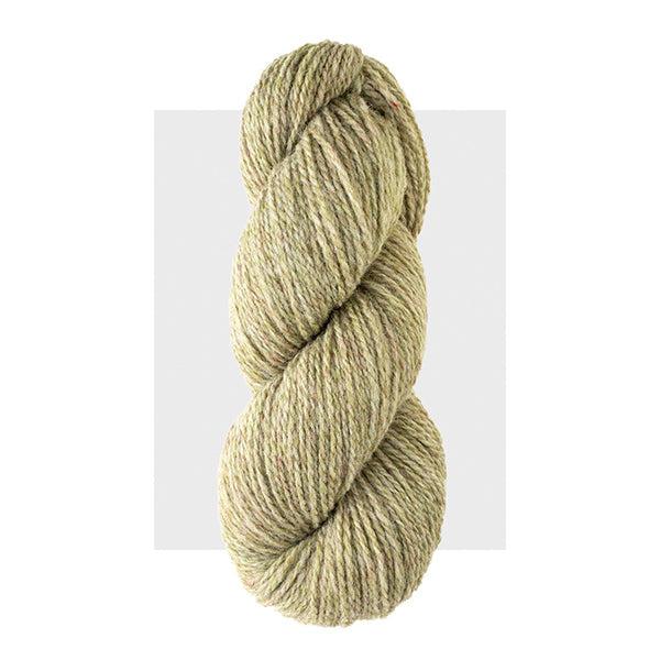 Skein of Harrisville Highland Jade, a pale yellow putty color.
