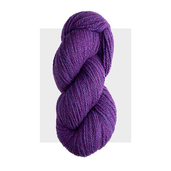 Skein of Harrisville Highland Violet, a bright purple with heathered periwinkle. 