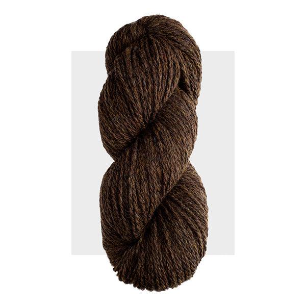 Skein of Harrisville Highland Walnut, a dark, cool brown heathered with slightly lighter brown.