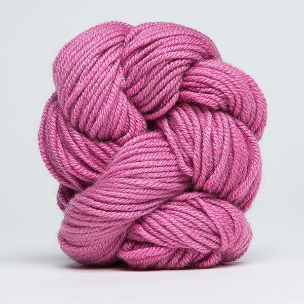 Skein of Jade Sapphire 4Ply Raspberry Mousse 68, a medium pink.