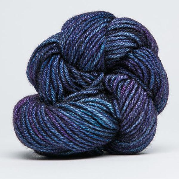 Skein of Jade Sapphire Cashmere 8Ply Extinction 168, a tonal deep blue with hints of purple.
