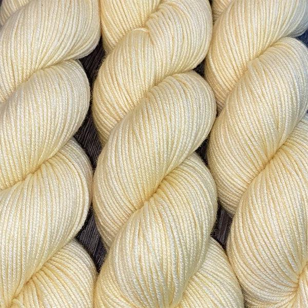 Skeins of JEMS Monster Minis Dolomite, a pale yellow with slight pink undertone. 