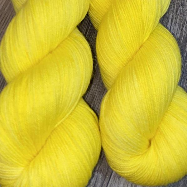Skeins of JEMS Monstrous Citrine, a bright yellow.