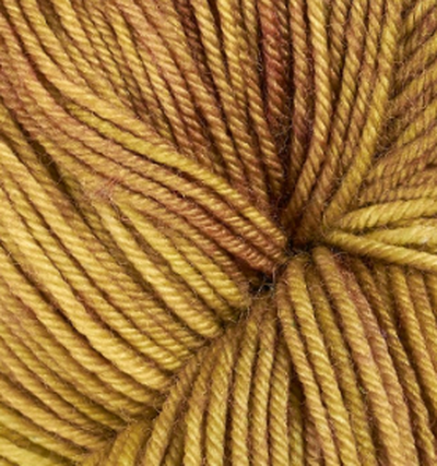 Detail of Knerd String 4ply Fingering Finally Fall a butternut squash color with muted red and brown undertones.