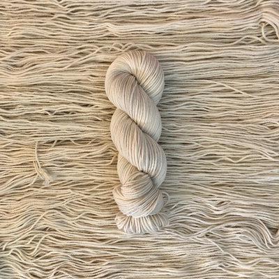 Detail of Knerd String SW Worsted in an ivory color. 