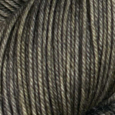 Detail of Knerd String SW Worsted Olive, My Love  a pale green olive color. 