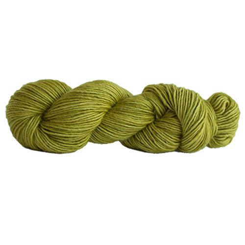 A skein of Manos Silk Blend Citric 3068, a  medium yellowy green.