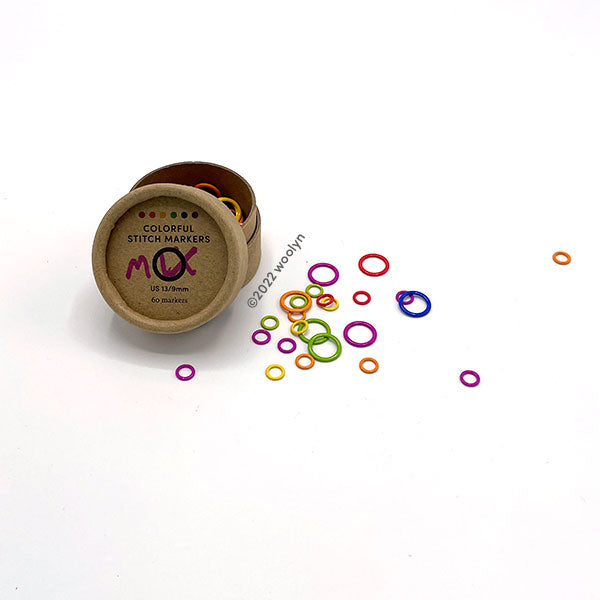 A mix of small and medium stitch markers in six colors: purple, yellow, green, orange, blue and red. 60 Markers.