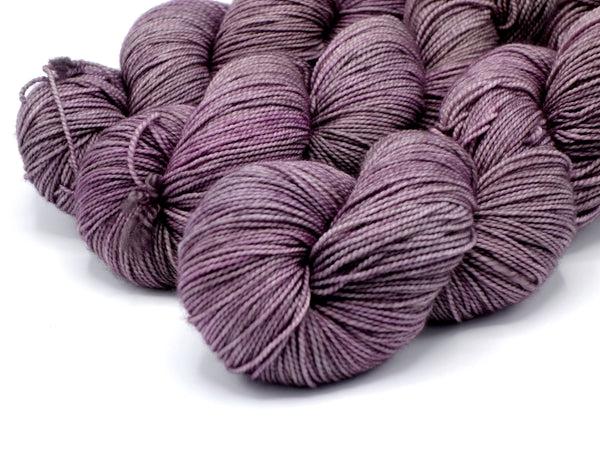 Skeins of Murky Depths Deep Sock Are We Puce Yet?, a tonal lavender with grey tones.