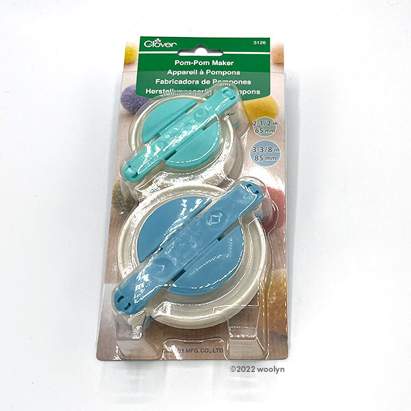 Clove Large pom pom maker in 2 sizes.  Makes pom poms approximately 2.5" and 3.5" in diameter.