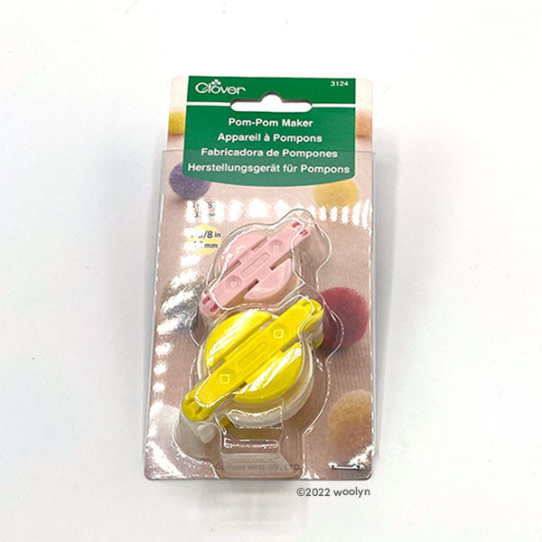 Clover Small pom pom maker in two sizes.  Makes pom poms approximately 1 1/2" and 1 3/4" in diameter.