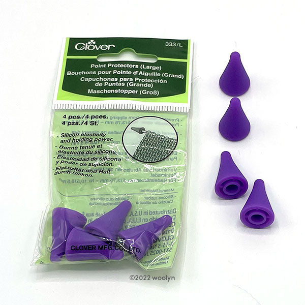 Large point protectors in purple. Four pieces per set.