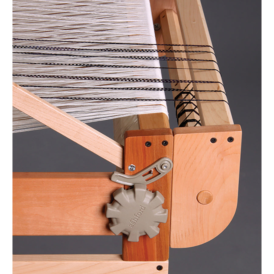 Second back beam for the Ashford Table Loom.  Shown with a supplemental warp in black.