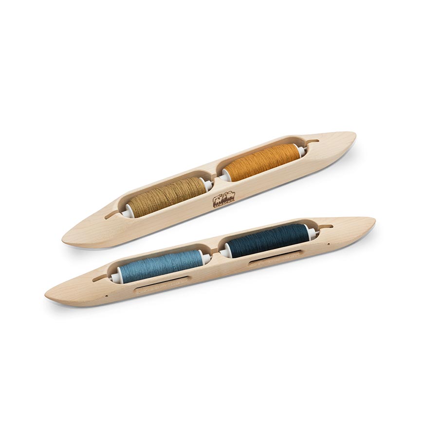 Image of a Schacht Double Boat Shuttle with a Slim Opening.