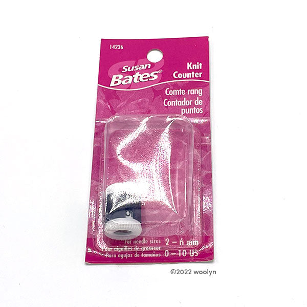 A black and white plastic row counter. 